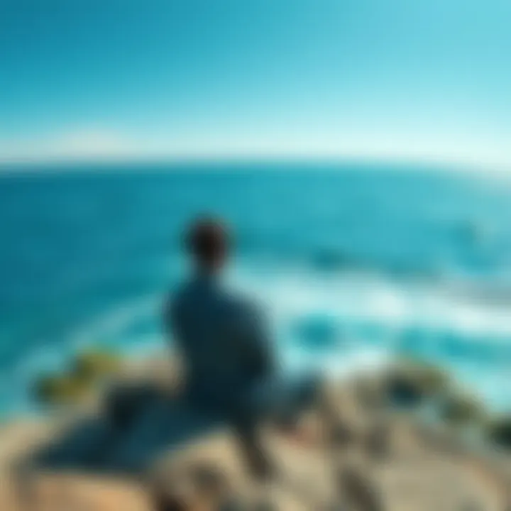 A Pisces man sits on a rocky shore, gazing at the ocean, reflecting on his emotions and life purpose.