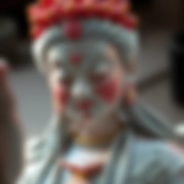 A beautiful porcelain statue of Guanyin, the Goddess of Compassion, showcasing detailed artwork and serene expression.