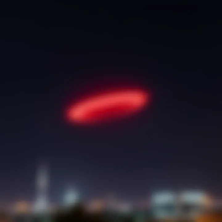 A large red object flying across the night sky over UST with stars visible in the background.