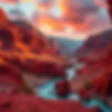 A scenic view of red earth landscapes with mountains in the background and a river flowing through the scene.