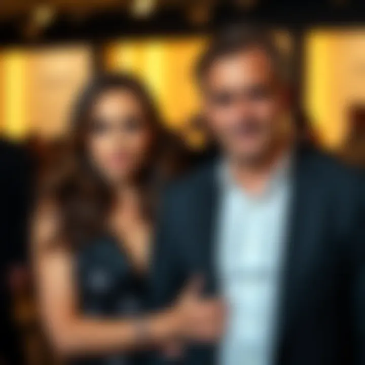 Salma Hayek with François-Henri Pinault posing together at a luxury fashion event, showcasing their connection to high-end brands.