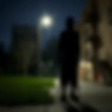 A dark silhouette stands near a Utah apartment complex under a dim streetlight, creating an eerie atmosphere.
