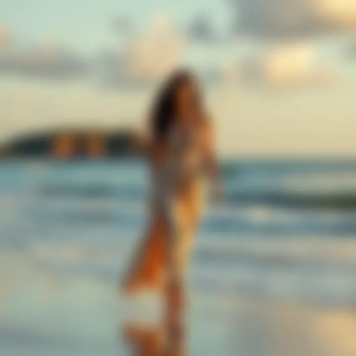 Sierra Rodriguez Poleon walking along the shoreline of Epstein's island, ocean waves lapping at her feet