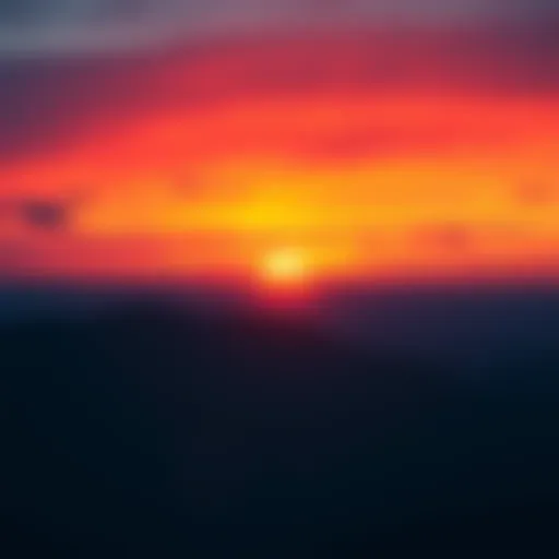 A vibrant sunset with orange and pink hues stretching across the sky, symbolizing the end of the day.