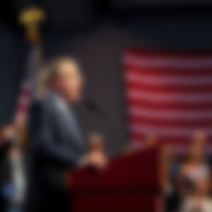 Thomas Massie at a podium, addressing a crowd with an American flag in the background, showcasing his engaging presence in politics.