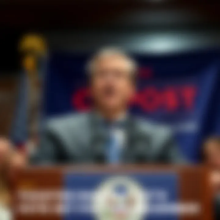 Thomas Massie speaking at a podium with a banner behind him about the Epstein Files vote