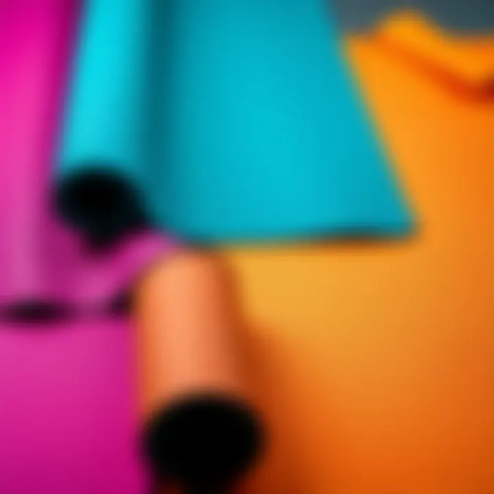 A selection of high-quality yoga mats laid out, showcasing different colors and textures, ideal for comfort and grip during yoga practice.