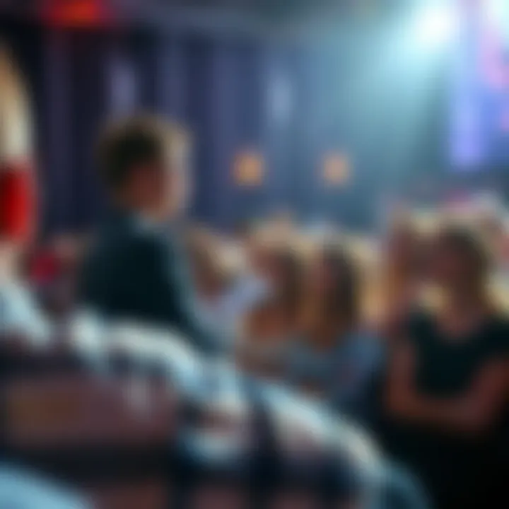Tyler Henry performing a reading on stage with attendees in the audience, showing their emotional reactions