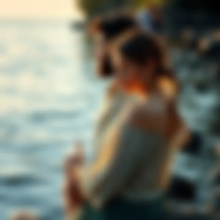 A peaceful scene showing a Cancer man and a Pisces woman sharing a moment by the water, symbolizing their connection and attraction.