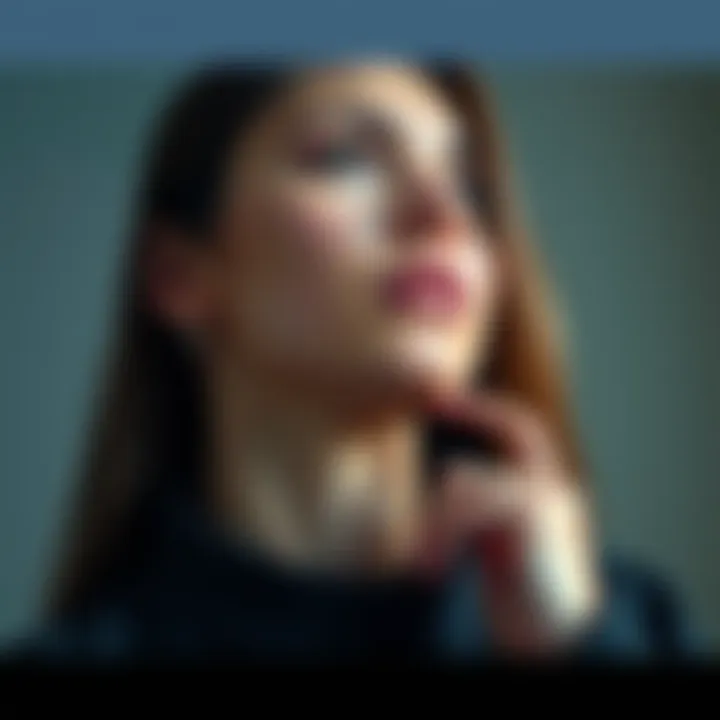 Woman with Birthmark on Neck A close-up of a woman touching a birthmark on her neck, looking thoughtful.