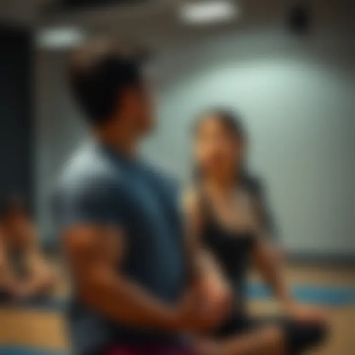 A yoga instructor looks concerned as a student quietly leaves the class early, causing distraction to others