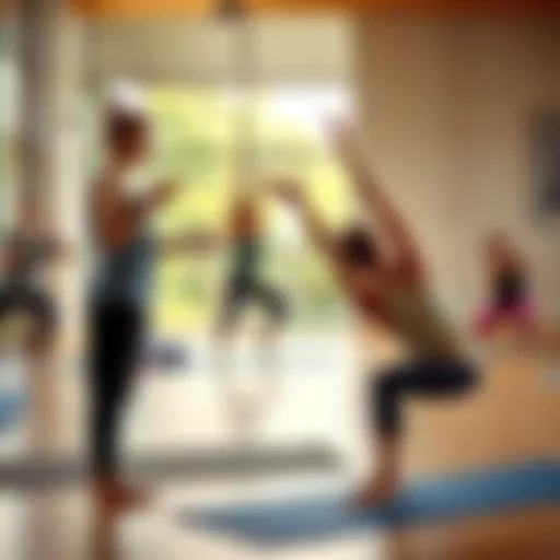 A yoga teacher guiding a class while an asana instructor demonstrates a pose.