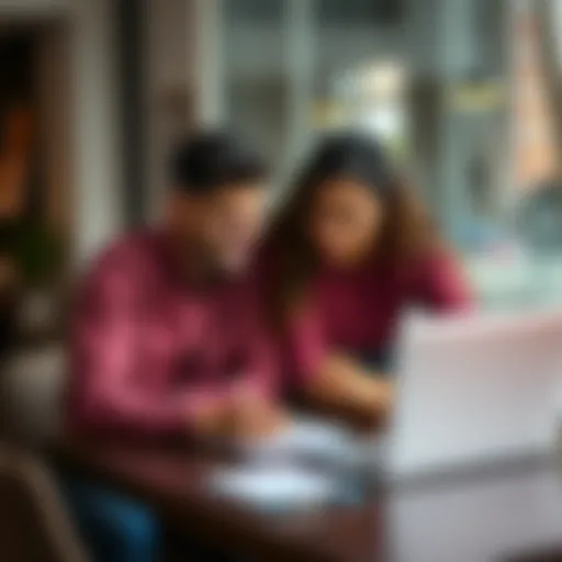 A 25-year-old couple sitting at a table, talking about balancing their marriage and career goals, with a laptop and notepad in front of them.
